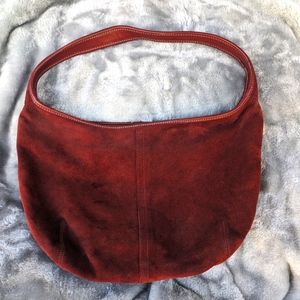 Coach cranberry saddle bag